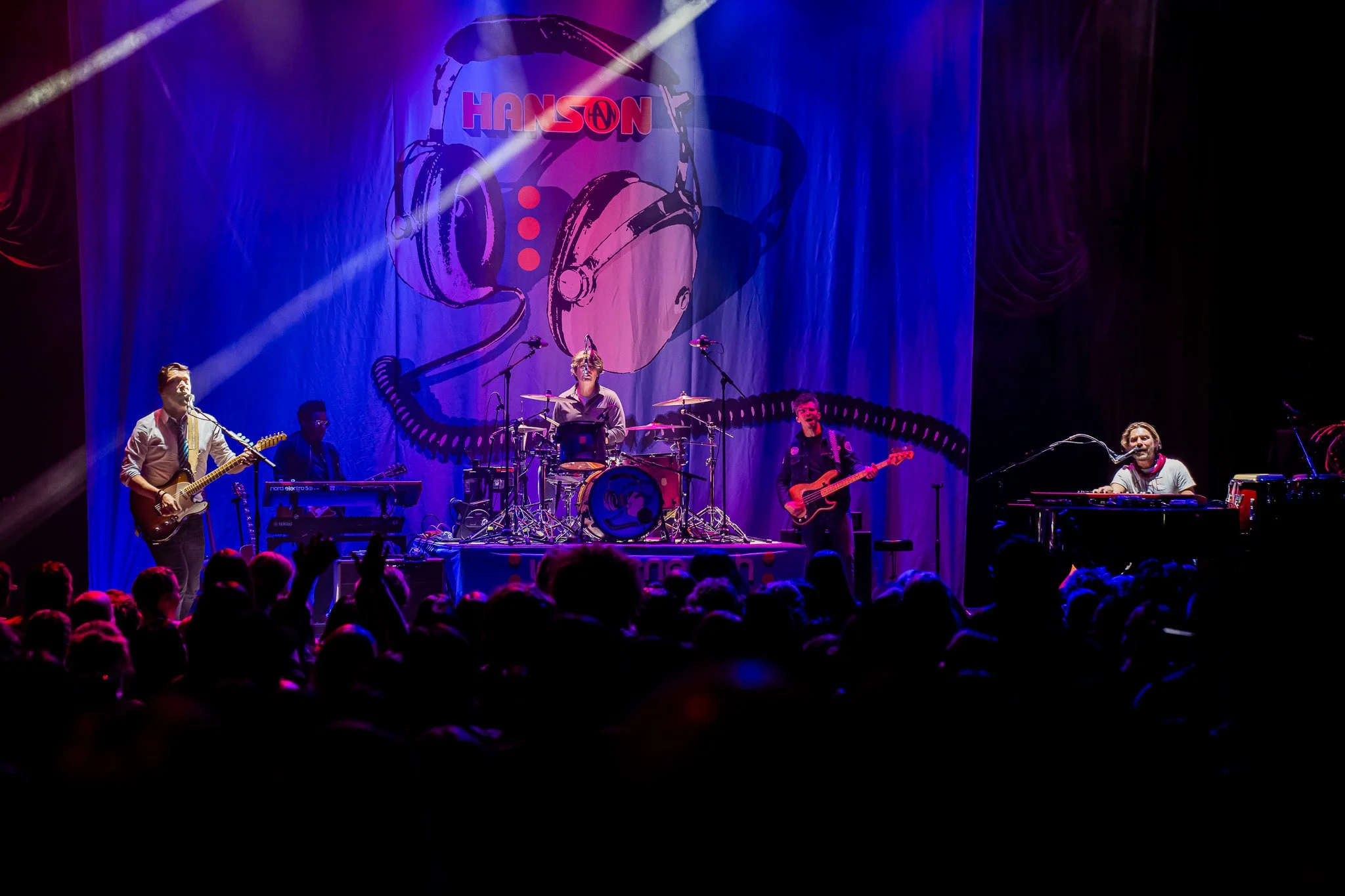 Hanson on stage